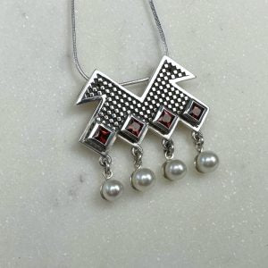 Double-headed bird pendant (Rana Mireskandari)