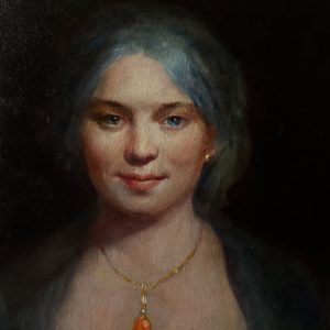 Woman with orange pendant (Tanyss Horsley)