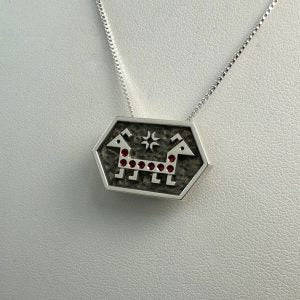 Double-headed animal pendant (Rana Mireskandari)